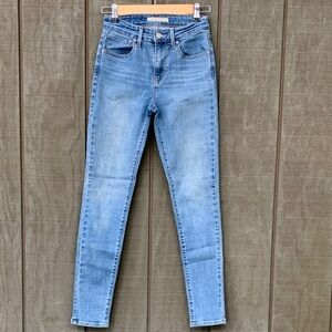 721 High Rise Skinny Jeans